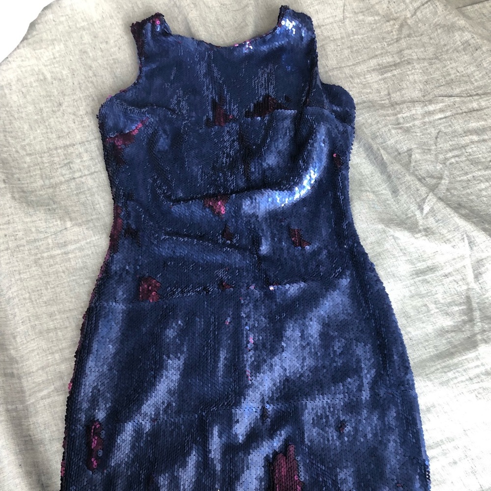 Sleeveless sequin Flip dress.